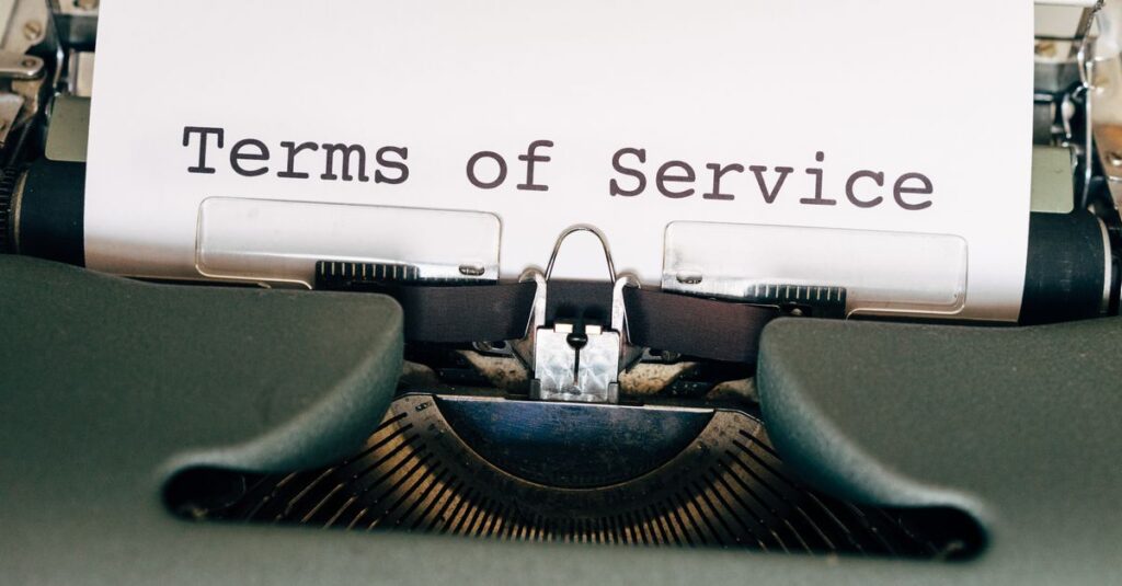 Terms of Service A vintage typewriter with a paper displaying 'Terms of Service'. Perfect for business or legal themes.